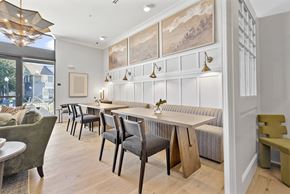 Cornelius apartment for rent - A dining room with a long table and chairs.