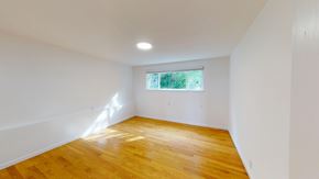 San Francisco apartment for rent - A room with wooden flooring and a window.