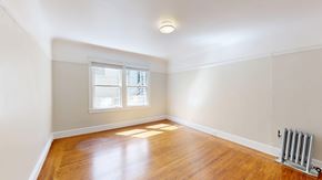 San Francisco apartment for rent - A room with wooden floors and a window.