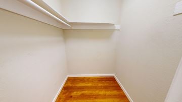 San Francisco apartment for rent - A room with a wooden floor and white walls.