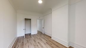 San Francisco apartment for rent - A room with a wooden floor and white walls.