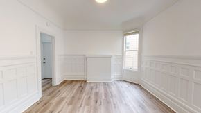 San Francisco apartment for rent - A room with white walls and wooden flooring.