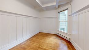 San Francisco apartment for rent - A room with wooden floors and white walls.