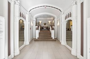San Francisco apartment for rent - A hallway with white walls and a staircase.
