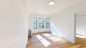 San Francisco apartment for rent - A room with a window and a white wall.