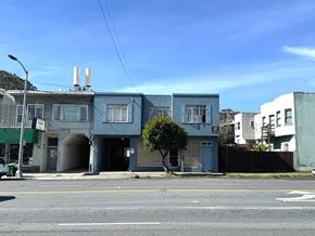 San Francisco apartment for rent - A blue building with a tree in front of it.