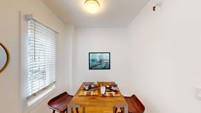San Francisco apartment for rent - A dining room with a wooden table and chairs.