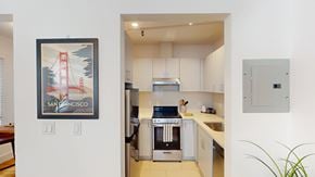 San Francisco apartment for rent - A San Francisco themed artwork hangs above a kitchen counter.
