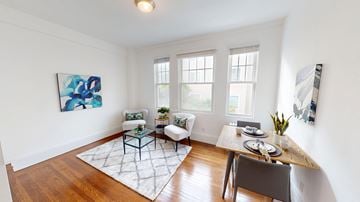 San Francisco apartment for rent - A dining room with a table set for two and a painting on the wall.