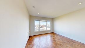 San Francisco apartment for rent - Empty room with wooden floors and a window.