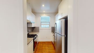 San Francisco apartment for rent - A kitchen with a refrigerator, stove, and oven.