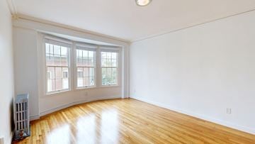 San Francisco apartment for rent - A room with a window and a radiator on the floor.