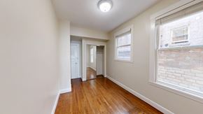 San Francisco apartment for rent - A room with wooden floors and white walls.