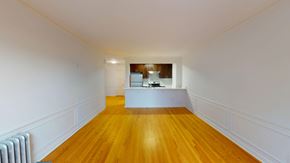 San Francisco apartment for rent - A room with wooden floors and white walls.