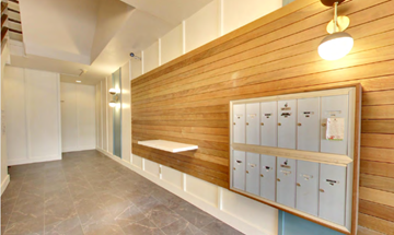 San Francisco apartment for rent - a locker room with a row of lockers and a bench