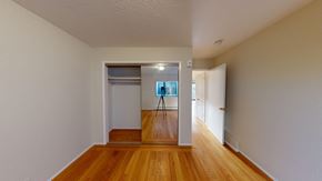 San Francisco apartment for rent - A room with wooden floors and white walls.