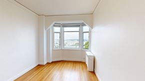 San Francisco apartment for rent - A room with a window and a radiator on the floor.
