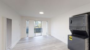 Berkeley apartment for rent - A room with a flat screen TV on top of a stand.