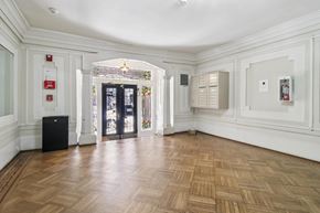 San Francisco apartment for rent - A room with wooden floors and white walls.