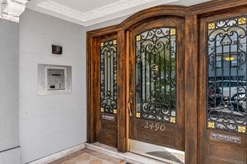 San Francisco apartment for rent - A brown door with the number 2490 on it and a sign that says "No Trespassing".