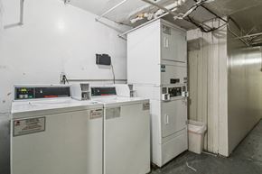 San Francisco apartment for rent - A white industrial machine with a red sticker on it.