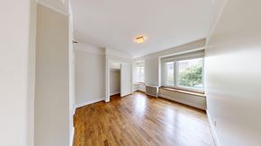 San Francisco apartment for rent - A room with wooden floors and white walls.