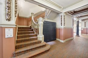 San Francisco apartment for rent - Grand hallway with a staircase adorned with a wooden railing