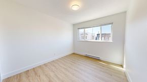 San Francisco apartment for rent - A room with a window and wooden flooring.