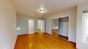 San Francisco apartment for rent - A room with wooden floors and white walls.