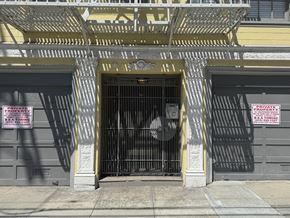 San Francisco apartment for rent - A gate with a sign that says private and towing.