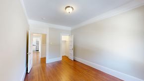 San Francisco apartment for rent - A room with wooden floors and white walls.