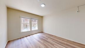 San Francisco apartment for rent - A room with a window and wooden flooring.