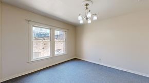 San Francisco apartment for rent - A room with a window overlooking a construction site.