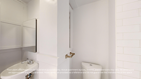 San Francisco apartment for rent - A white bathroom with a toilet, sink, and a mirror.