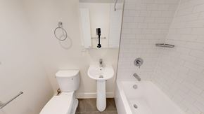 San Francisco apartment for rent - A white toilet and sink in a small bathroom.