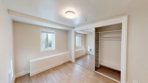 San Francisco apartment for rent - A room with a window and a wooden floor.