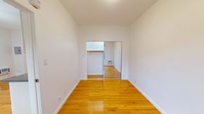 San Francisco apartment for rent - A room with wooden floors and white walls.