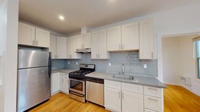 San Francisco apartment for rent - A kitchen with a stainless steel refrigerator, stove, and oven.