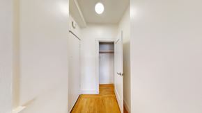 San Francisco apartment for rent - A long hallway with a door at the end.