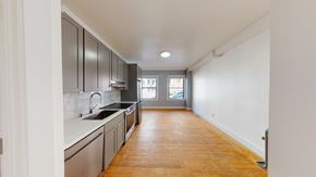 San Francisco apartment for rent - A kitchen with wooden floors and white walls.