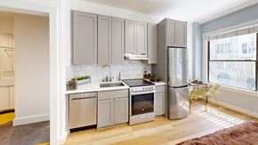 San Francisco apartment for rent - A modern kitchen with stainless steel appliances and wooden floors.