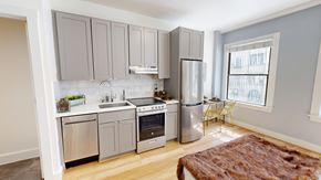 San Francisco apartment for rent - A kitchen with a refrigerator, oven, and sink.