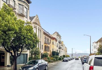 San Francisco apartment for rent - a city street with cars parked on the side of the road