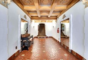 San Francisco apartment for rent - Hallway with a staircase with a wooden banister