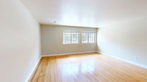 San Francisco apartment for rent - A room with wooden floors and a window.