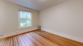 San Francisco apartment for rent - A room with wooden flooring and a window.