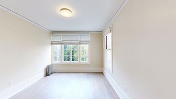 San Francisco apartment for rent - A room with a window and a radiator on the floor.