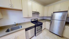 San Francisco apartment for rent - A kitchen with a stove, sink, and refrigerator.