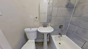 San Francisco apartment for rent - A white toilet and sink in a bathroom.