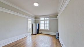 San Francisco apartment for rent - A room with a window and a radiator on the floor.